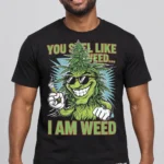 I Am Weed on a model wearing a black graphic T-shirt with C63s.com hem branding