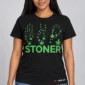 Stoner Leaf Fall on a model wearing a black graphic T-shirt with C63s.com hem branding